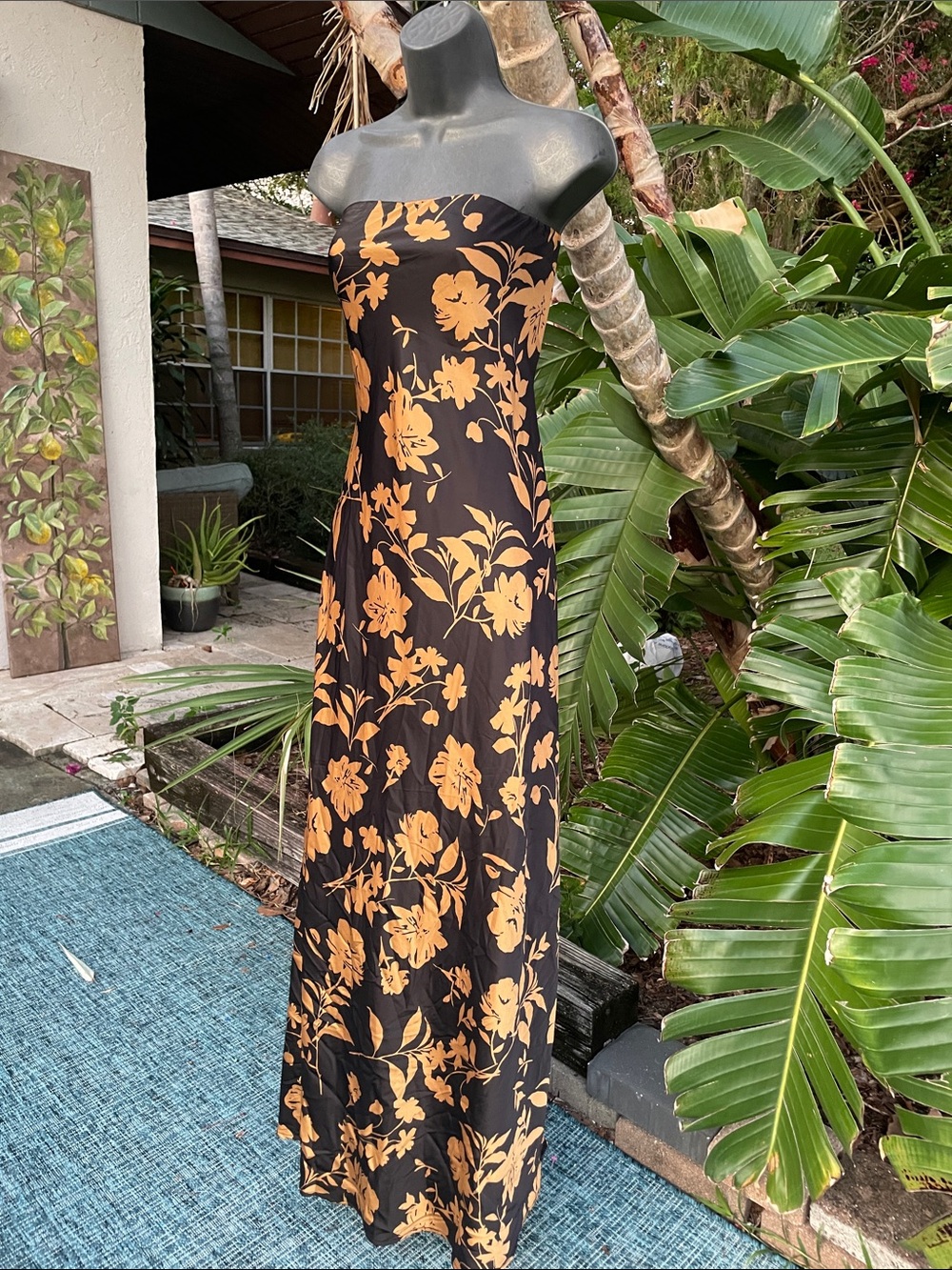 strapless dark floral biased, cut maxi dress with slit